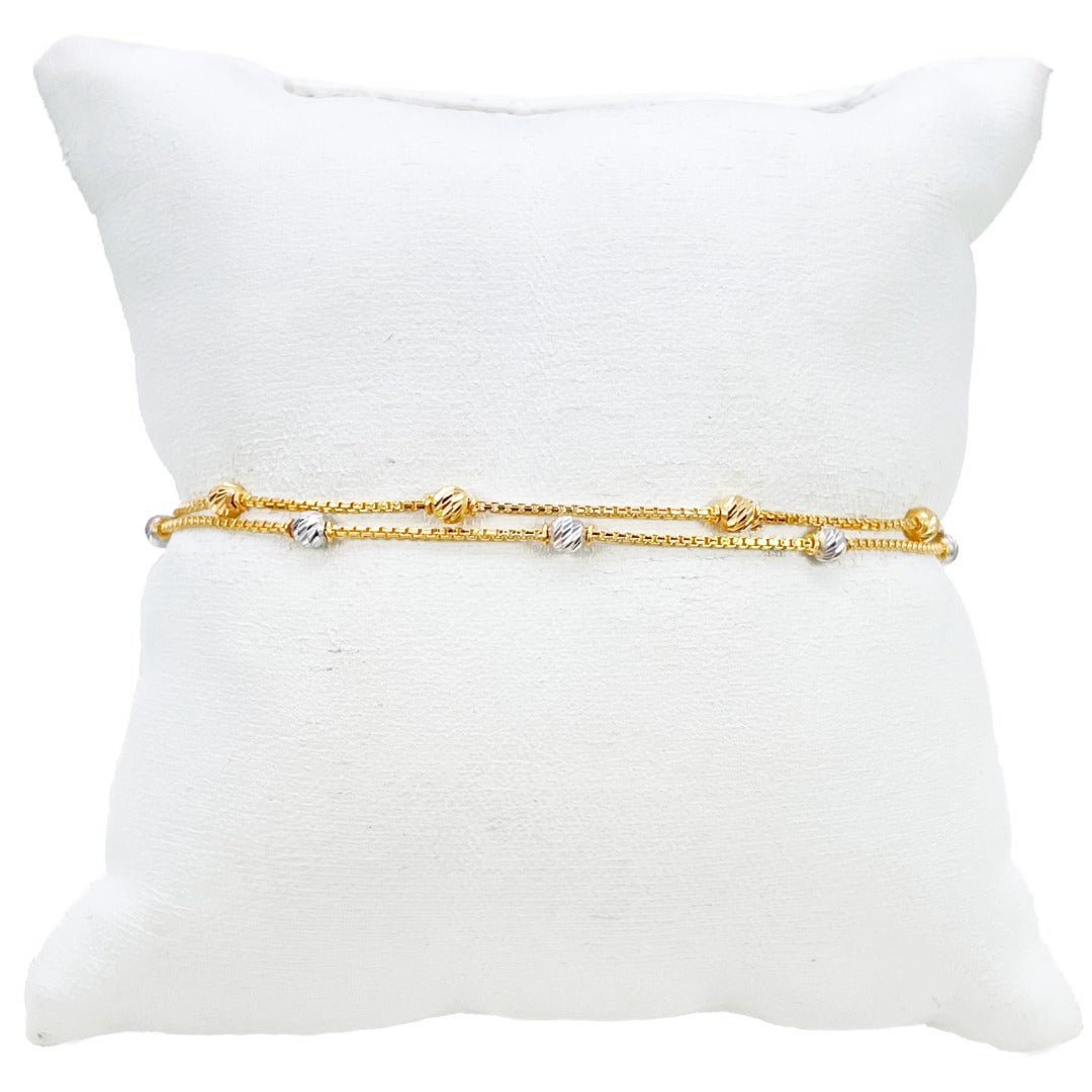 22-karaats geelgouden dubbele ketting met tweekleurige diamantgeslepen kralen armband
