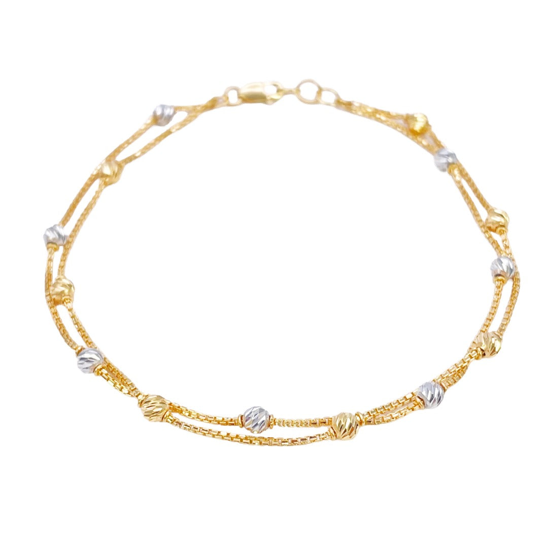 22-karaats geelgouden dubbele ketting met tweekleurige diamantgeslepen kralen armband